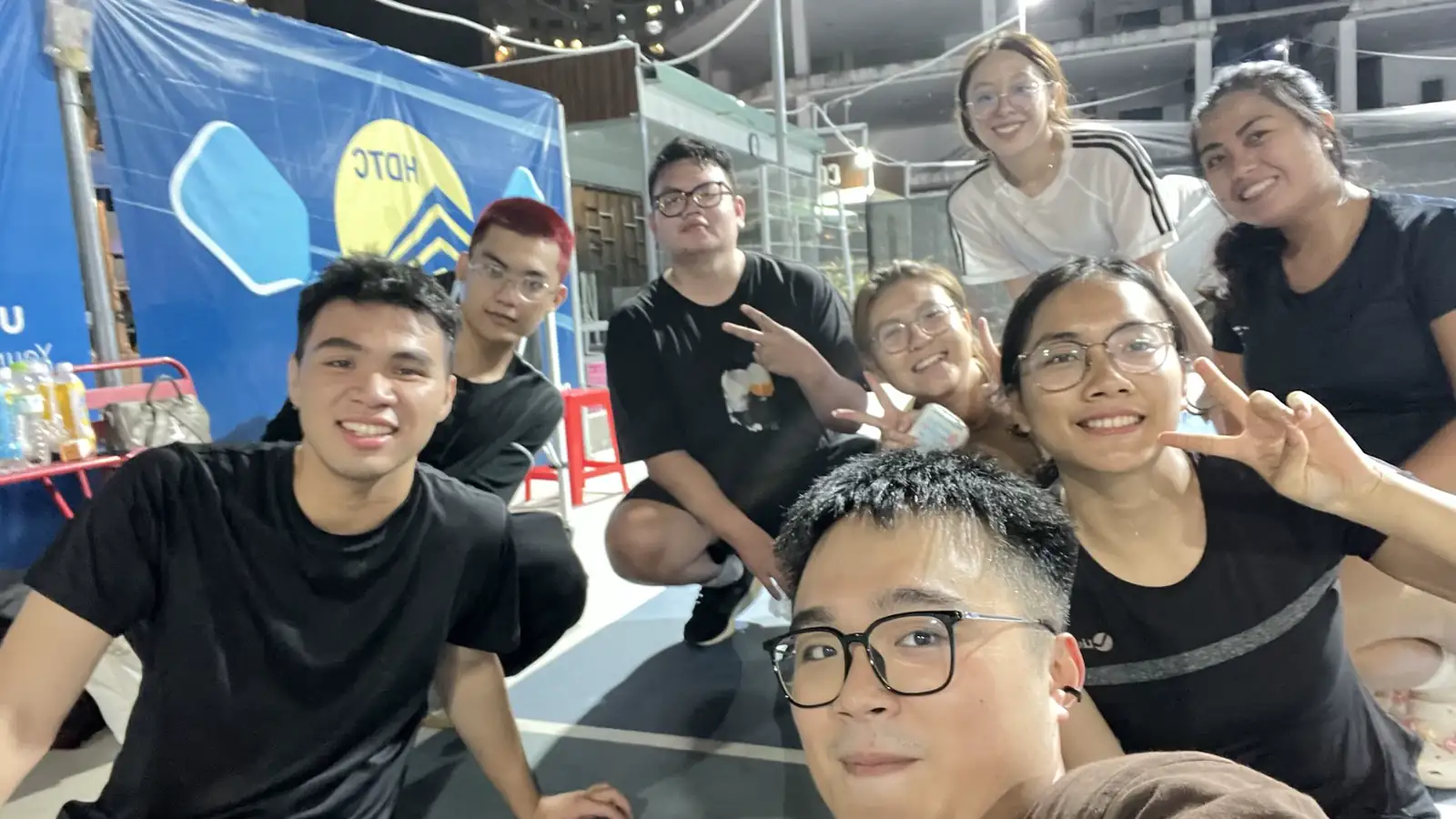 Night pickleball-court selfie after play